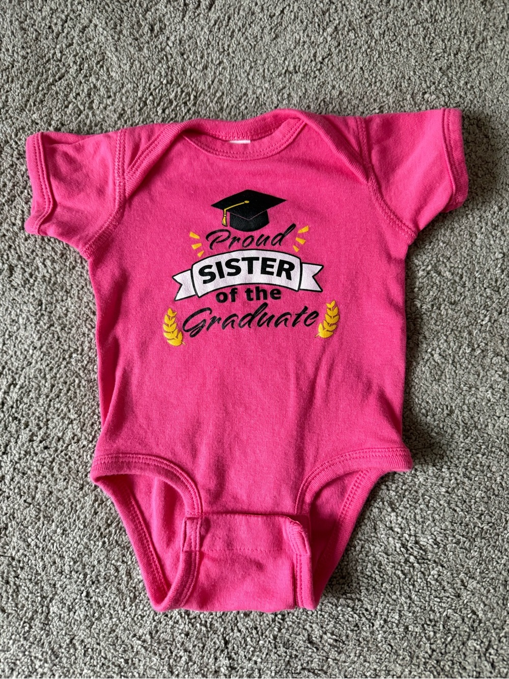 Rabbit Skins Hot Pink "Proud Sister of the Graduate" Baby One-Piece